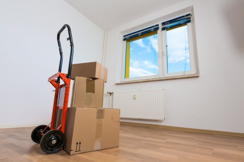 Local movers loading a small van for a Bayswater removal job